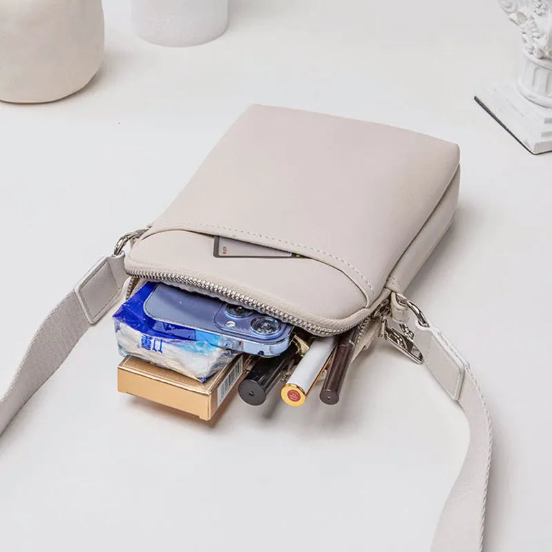 Solid colour PU mobile phone crossbody shoulder bag in black, beige, khaki, or green.