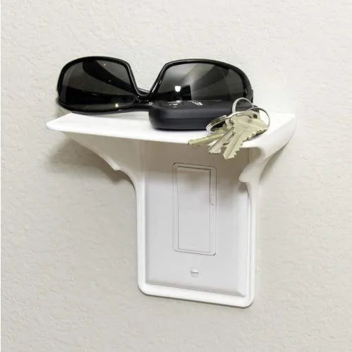 White plastic socket storage rack on a workbench.