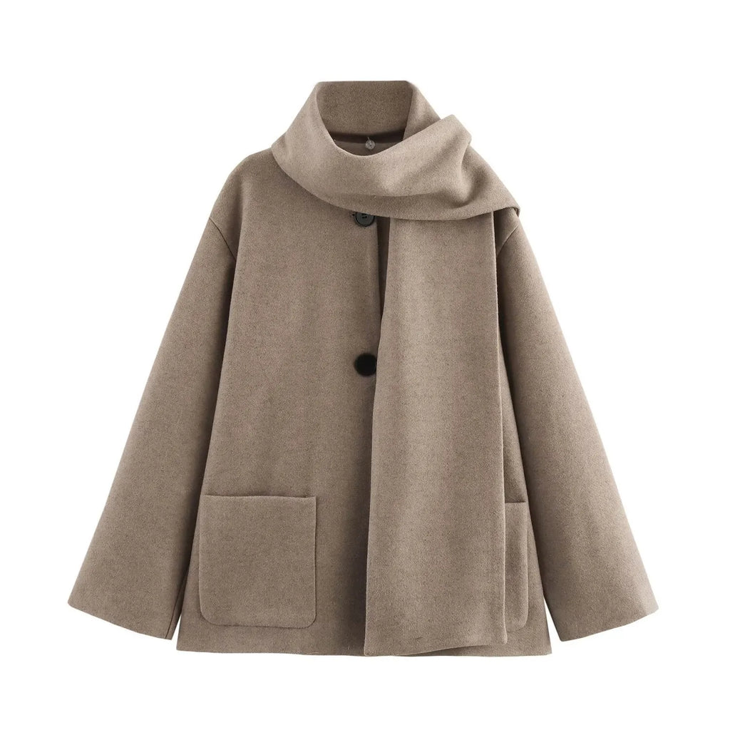 Women's longline street fashion coat with artificial fur collar in lengthened silhouette