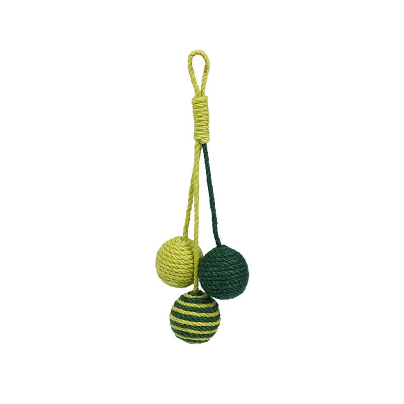 Four-piece cat toy set with teaser stick, catnip ball, and self-play toys on blue background