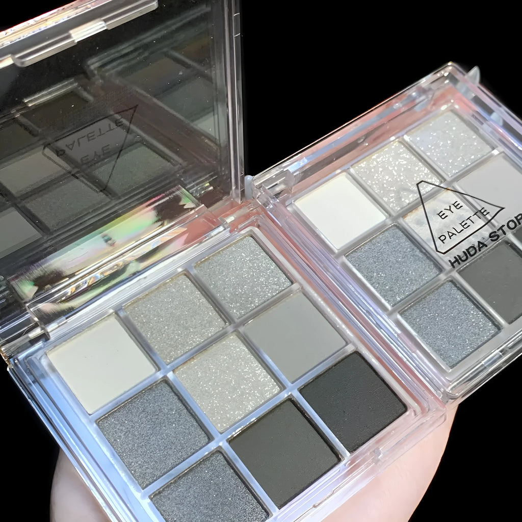 Smoked design nine-colour eyeshadow palette showing white, silver, black, and iron grey shades