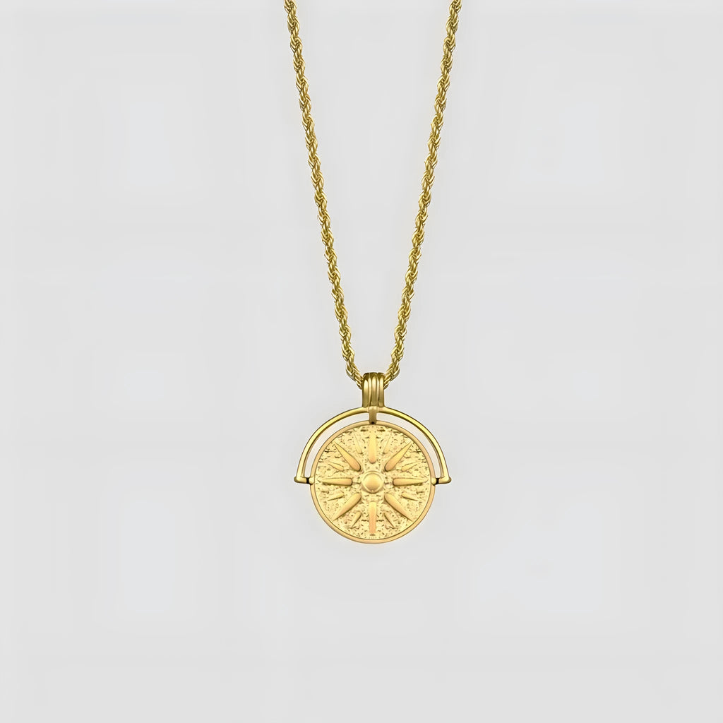 Gold titanium steel necklace with round embossed sunflower pendant and hemp chain.