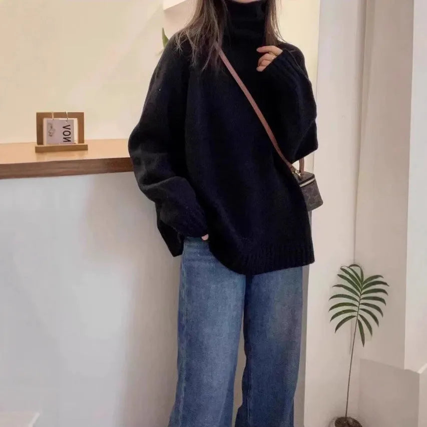 Women's thick turtleneck sweater in solid color with loose casual fit and curled pile collar detail, available in red, camel, gray, and black