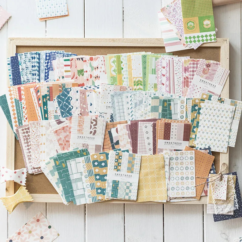 Pack of 50 retro collage design note papers in dessert-themed colours, each sheet 56mm by 83mm.