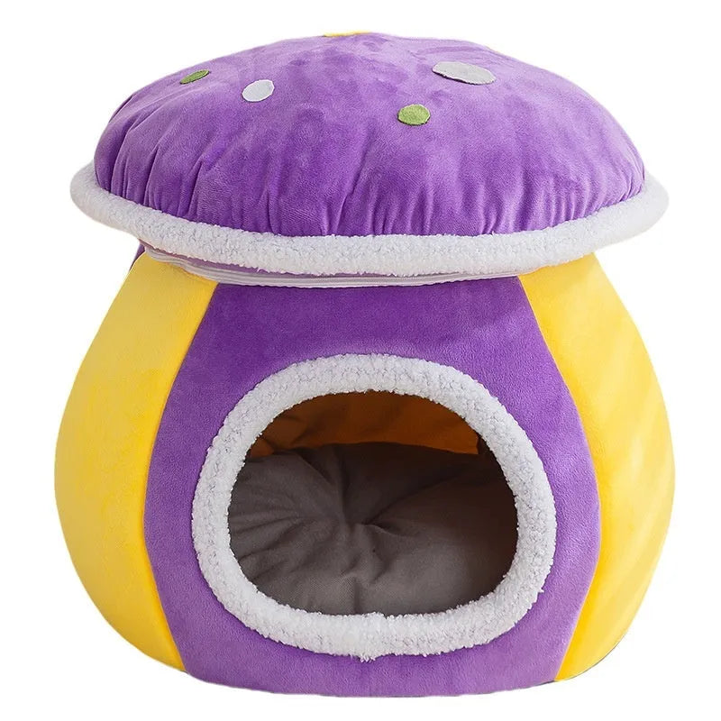 Grey mushroom-shaped plush cat bed on a wooden floor.