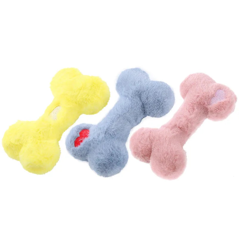 Blue love bone shaped plush dog toy with squeaker for biting and chewing.