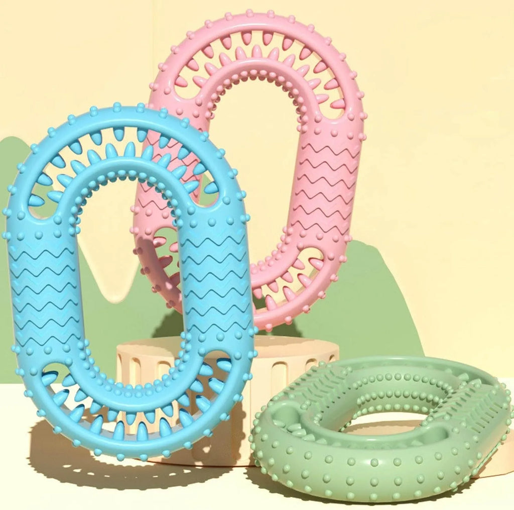 Blue durable rubber O-ring dog chew toy with dental cleaning ridges for aggressive chewers