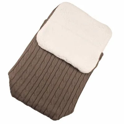Baby stroller sleeping bag with thick filling in envelope design, shown in beige colour.