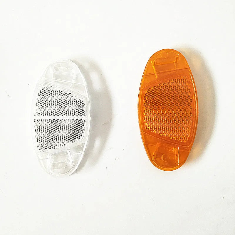 Bicycle plastic spoke reflector in white or yellow measuring 7.2cm length by 3.5cm width