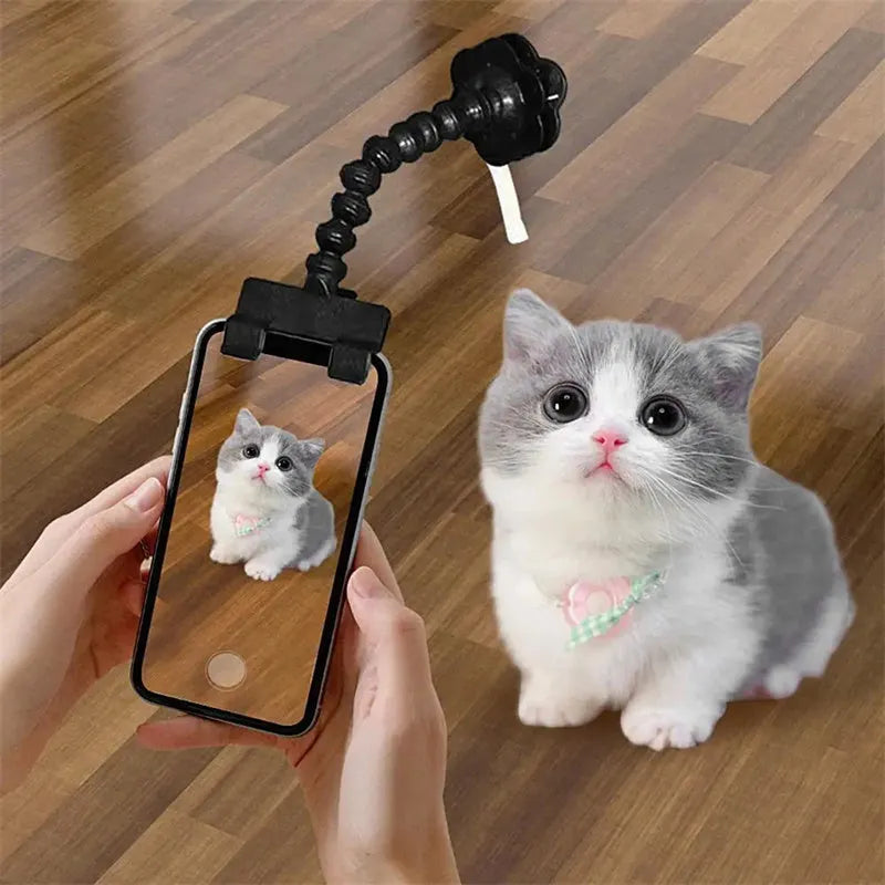 Black plastic pet selfie stick with treat clip extended to 15cm for mobile phone photography