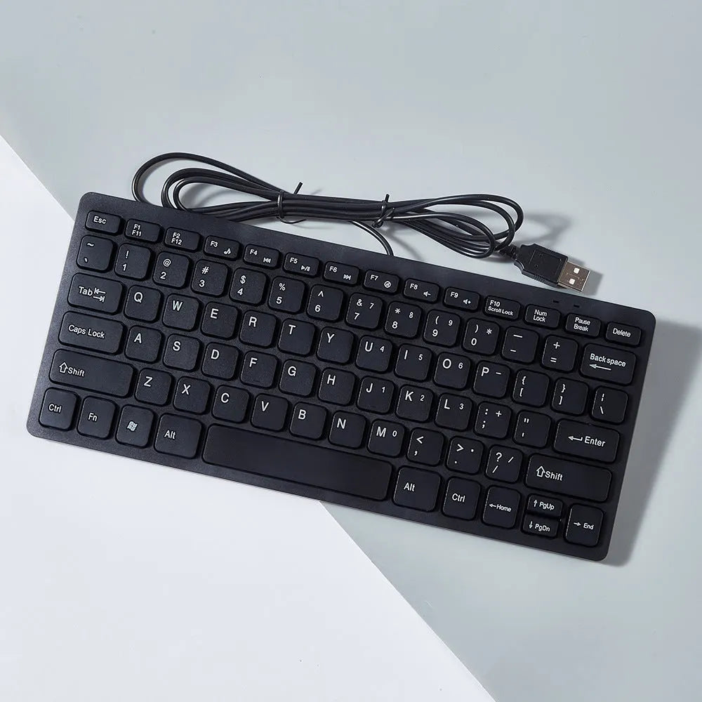 USB wired mini keyboard in black, white, pink or blue colours showing compact size