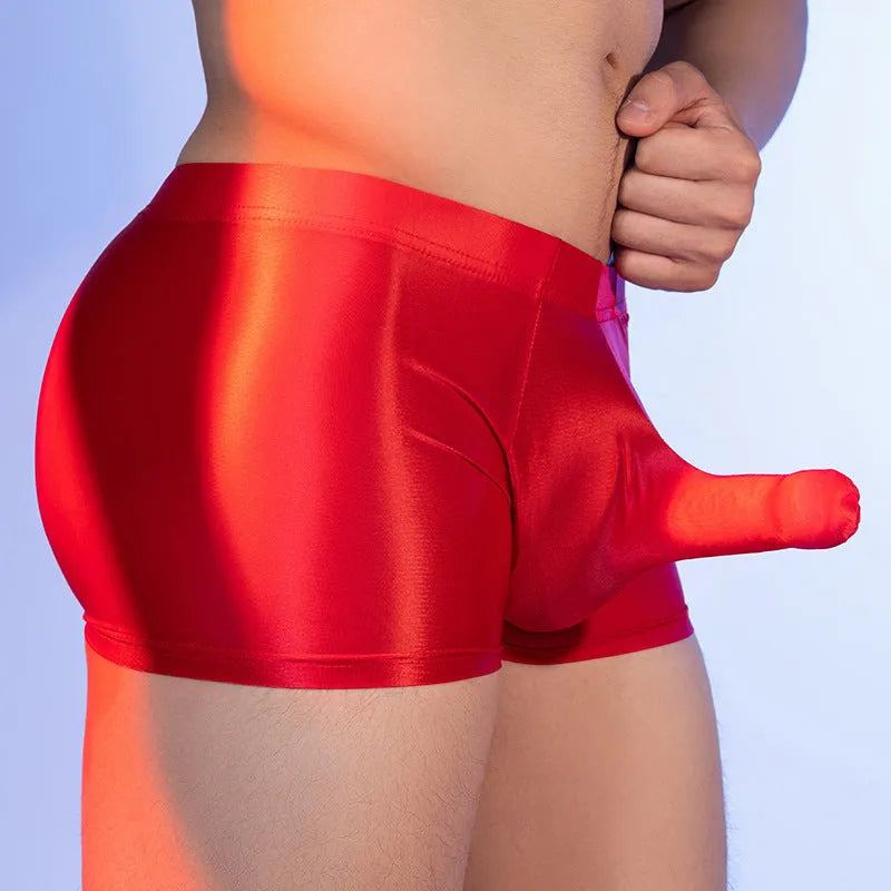 Men's elephant print nylon boxers in red, shown as thin, seamless mid-waist shorts.