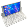 Black folding wireless Bluetooth keyboard for tablets with aluminium bottom and wrist support
