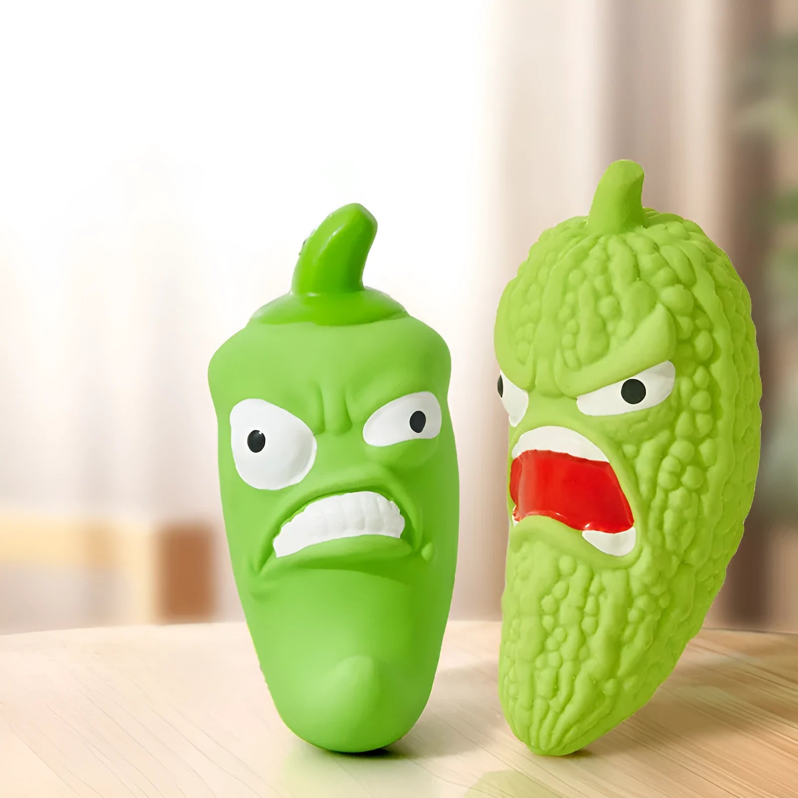 Natural rubber dog chew toy in bitter gourd or chilli shape for grinding teeth.