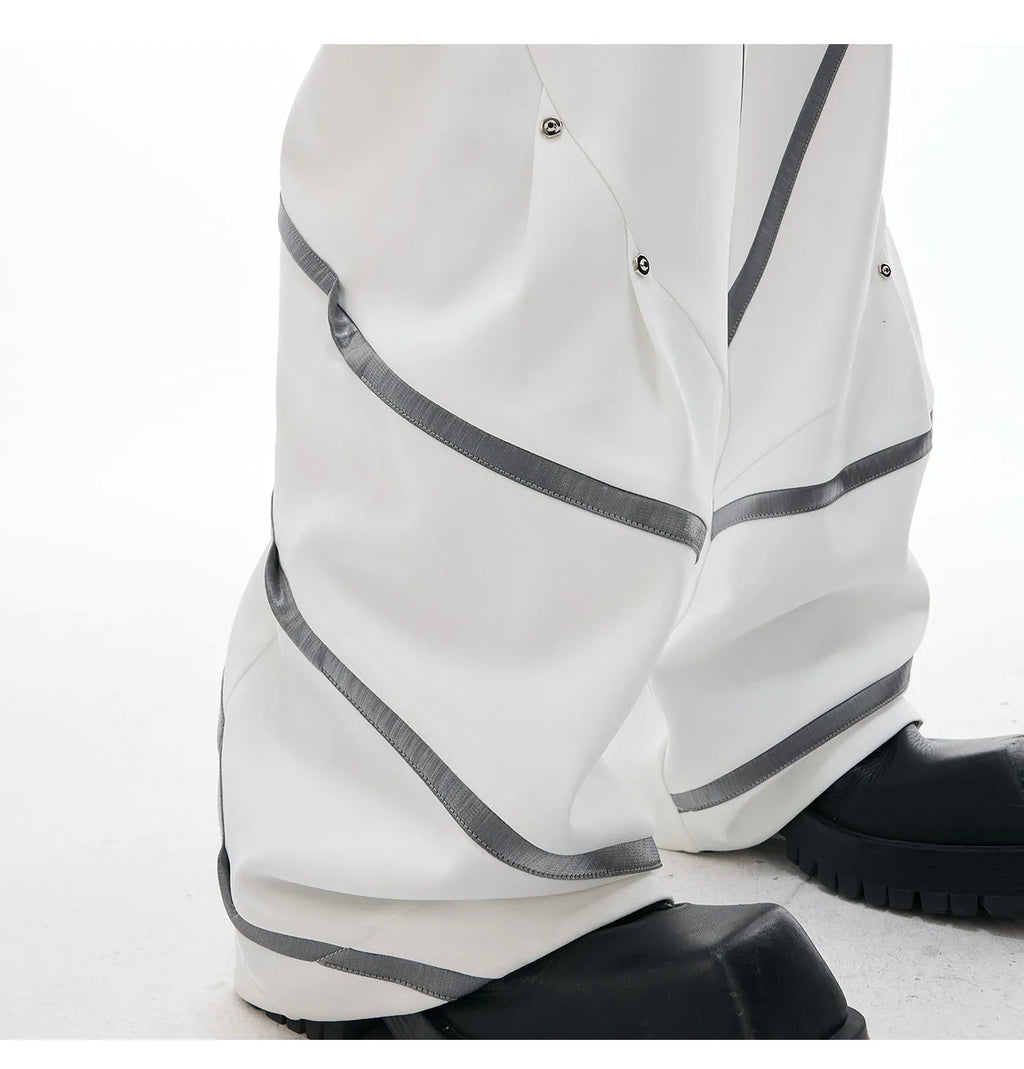 Men's trousers with metal striped rivet pleated design and three-dimensional cutting in polyester fabric