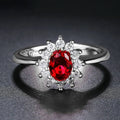 Women's floral copper ring with electroplated blue moissanite colour and zirconium detailing.