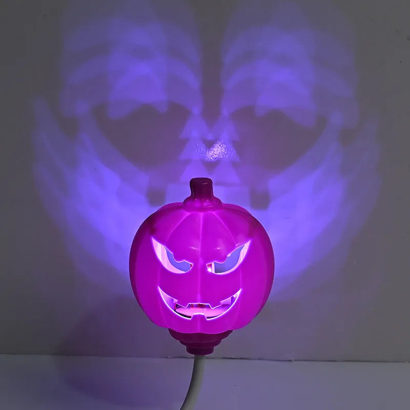Plastic pumpkin lamp with USB port showing yellow and purple light options