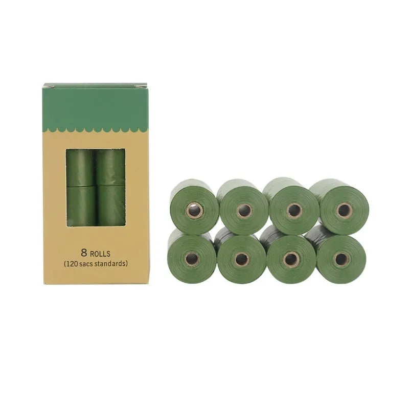 Rolls of green, black, blue, purple, and orange EPI degradable pet poo bags with a plastic dispenser.