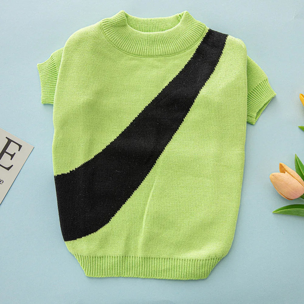A corgi or poodle wearing a casual-style wool sweater in one of six available colours.