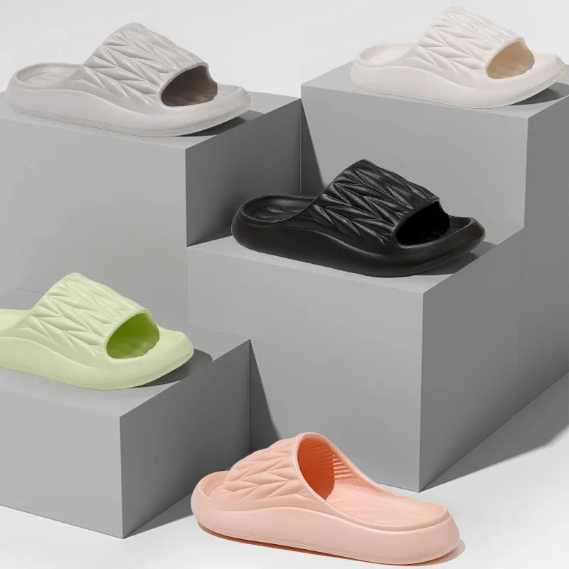 Leaf texture design EVA household slippers in multiple colours on a white background.