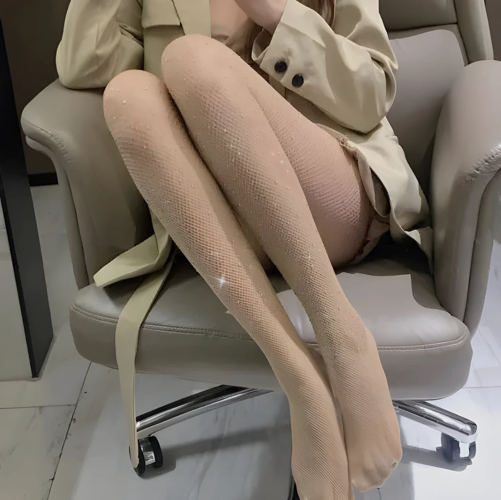 Women's fishnet stockings with diamond mesh pattern in black, skin colour, or white.