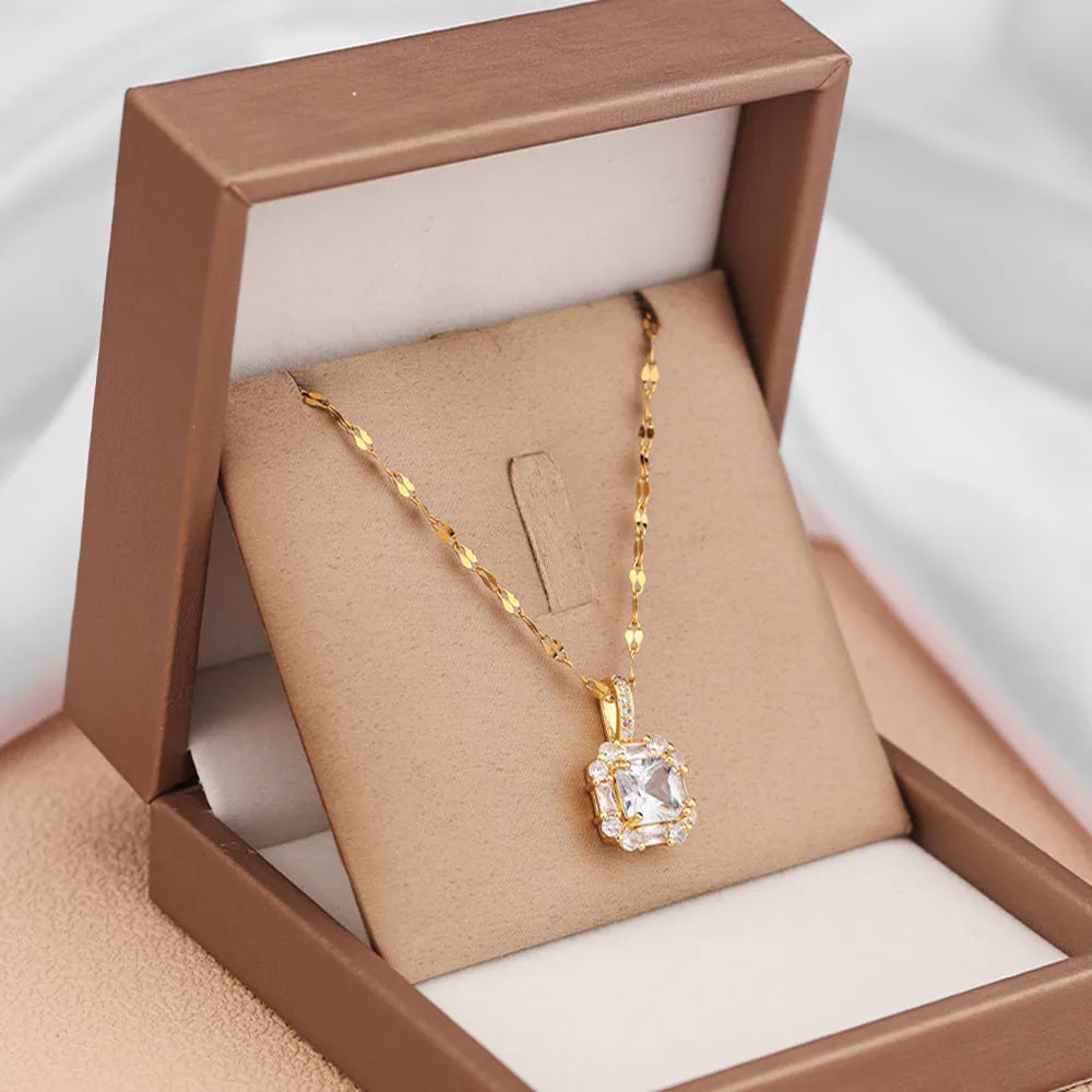 Women's gold titanium steel necklace with quadrilateral gem-inlaid pendant on water wave chain