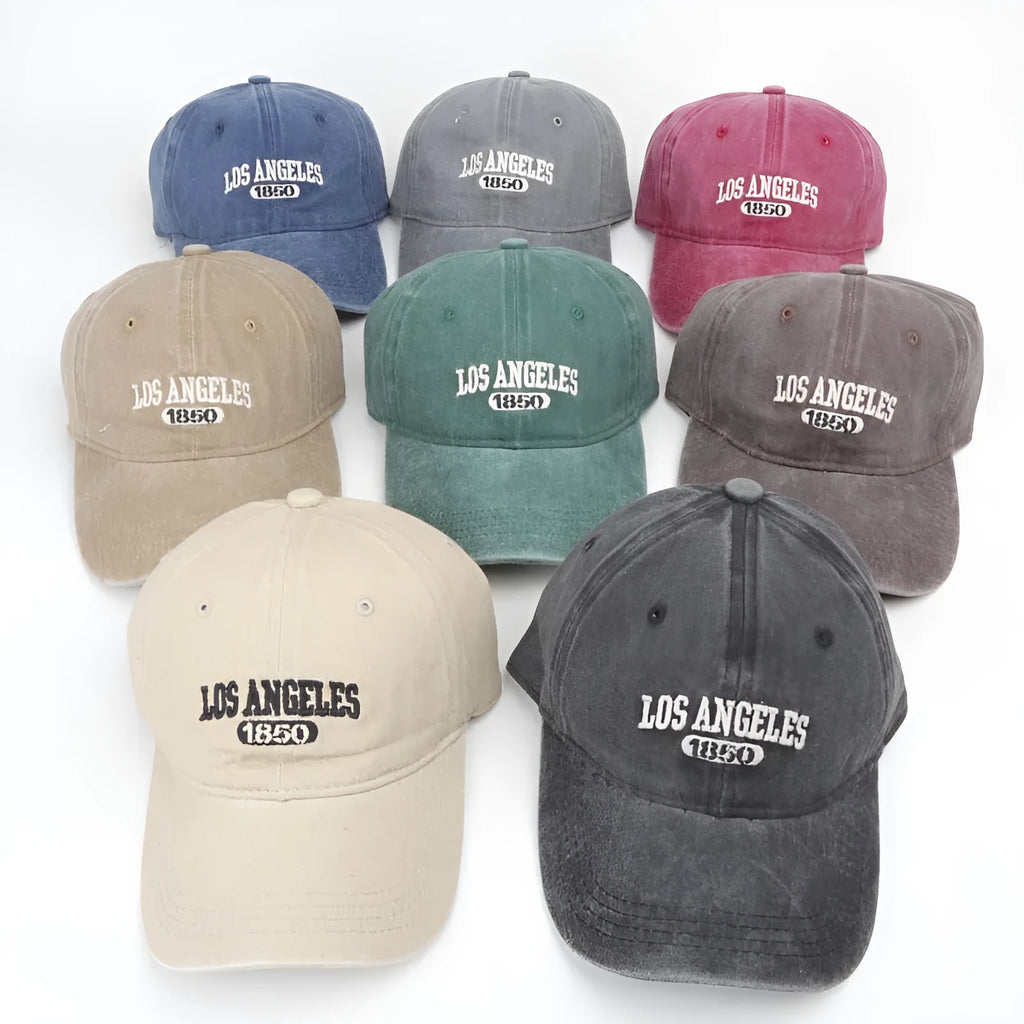 Retro personalised embroidered washed distressed peaked cap in beige with an adjustable strap.
