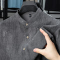 Men's loose-fit linen cardigan-style short sleeve shirt in solid black grey colour.