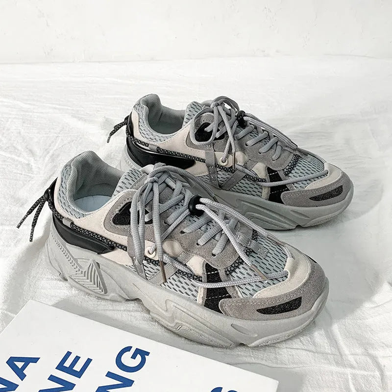 Men's white Korean style platform sneakers with lace-up front on a neutral background.