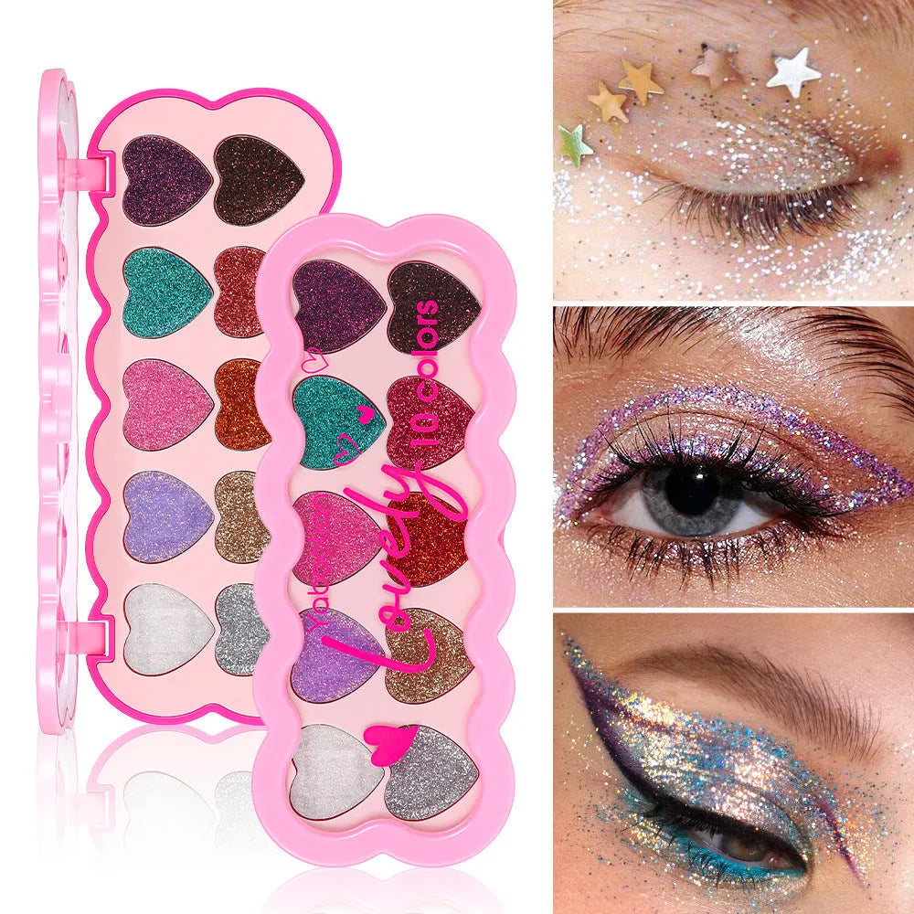 Heart-shaped makeup palette open to show ten pearlescent eyeshadow pans in various colours.
