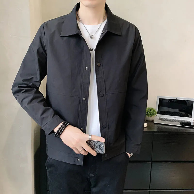 Men's Korean style single-layer polyester jacket in light grey, shown on a model.