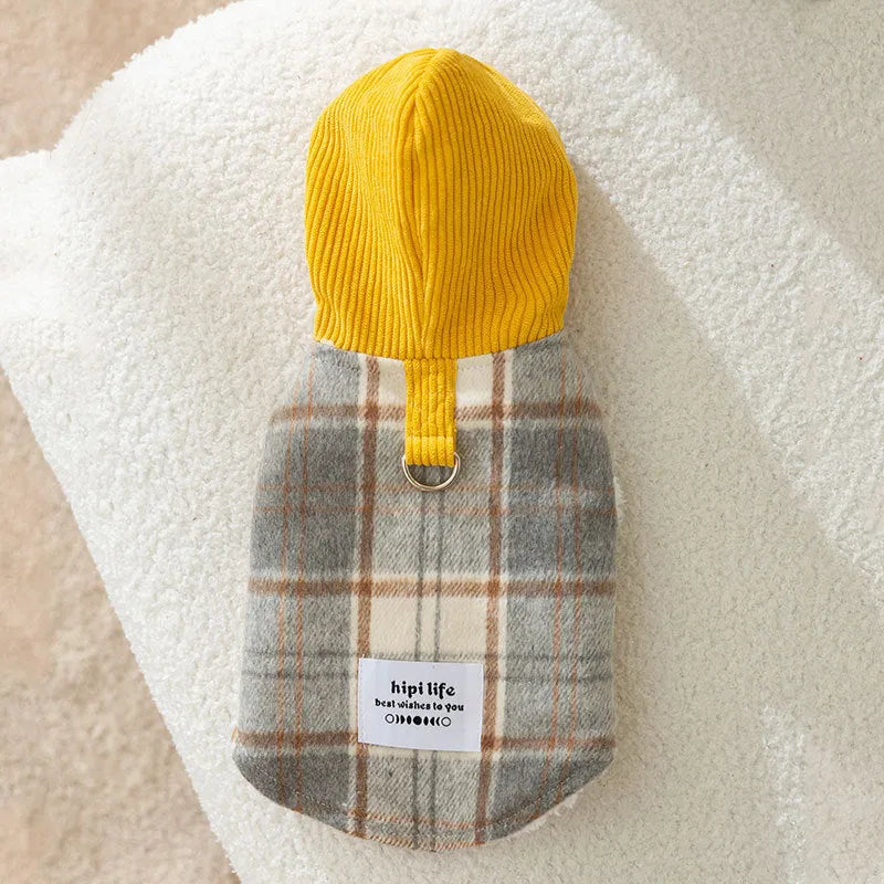 Blue corduroy dog vest with chessboard grid pattern and a hooded traction design.