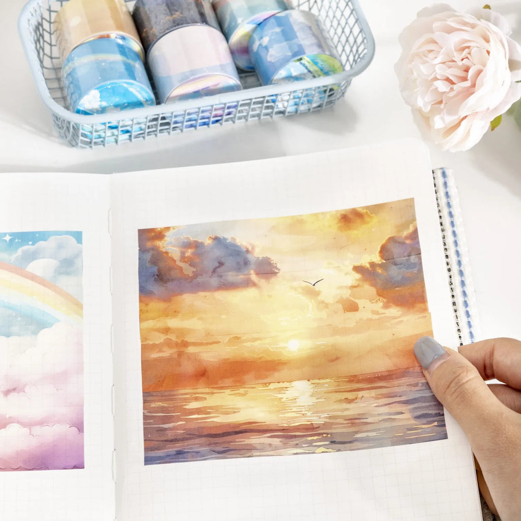 Roll of 30mm Japanese paper tape featuring sky themes like moonlight and clouds for journal decoration