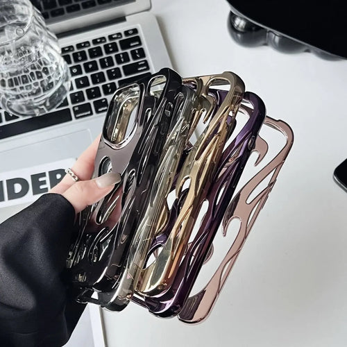 Apple iPhone case with hollow flame pattern and electroplated finish in silver, shown on a phone.