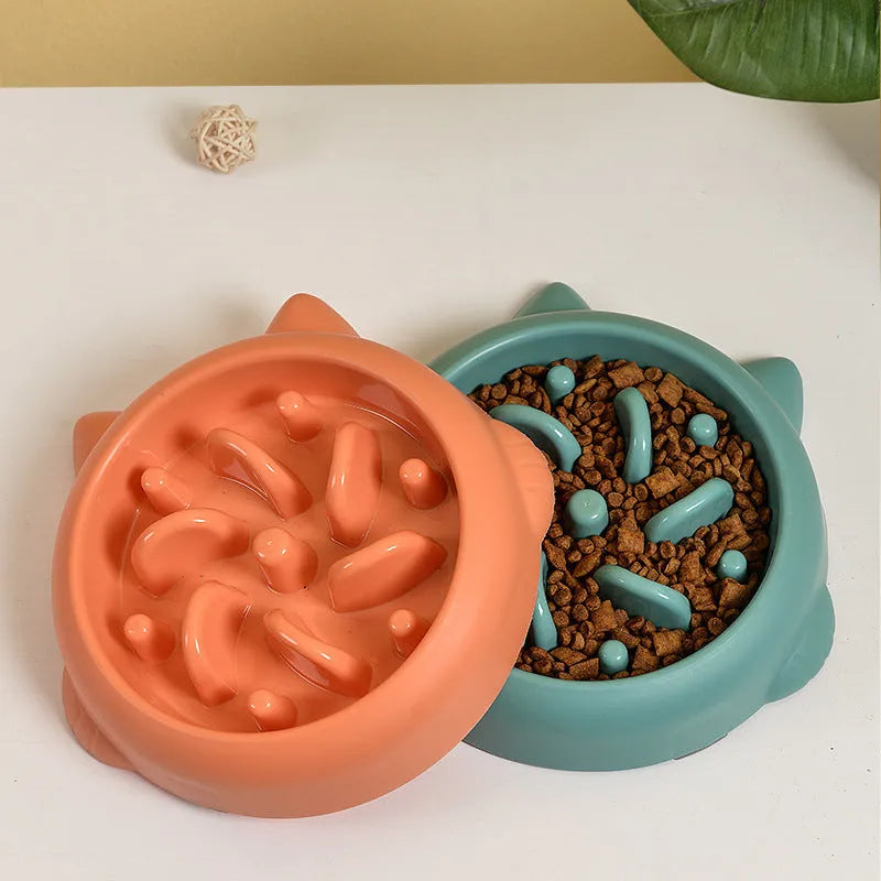 Green bone maze slow feeder dog bowl made of PP plastic for anti gulping and choking.