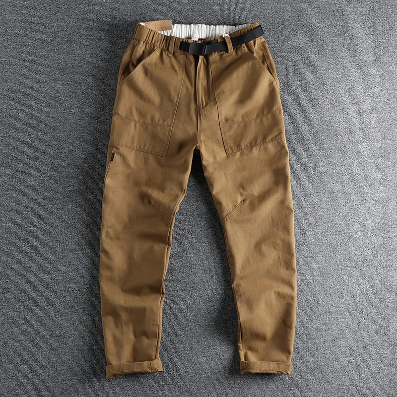 Cotton work trousers with N I buckle belt in khaki or dark blue colours showing three-dimensional cutting design