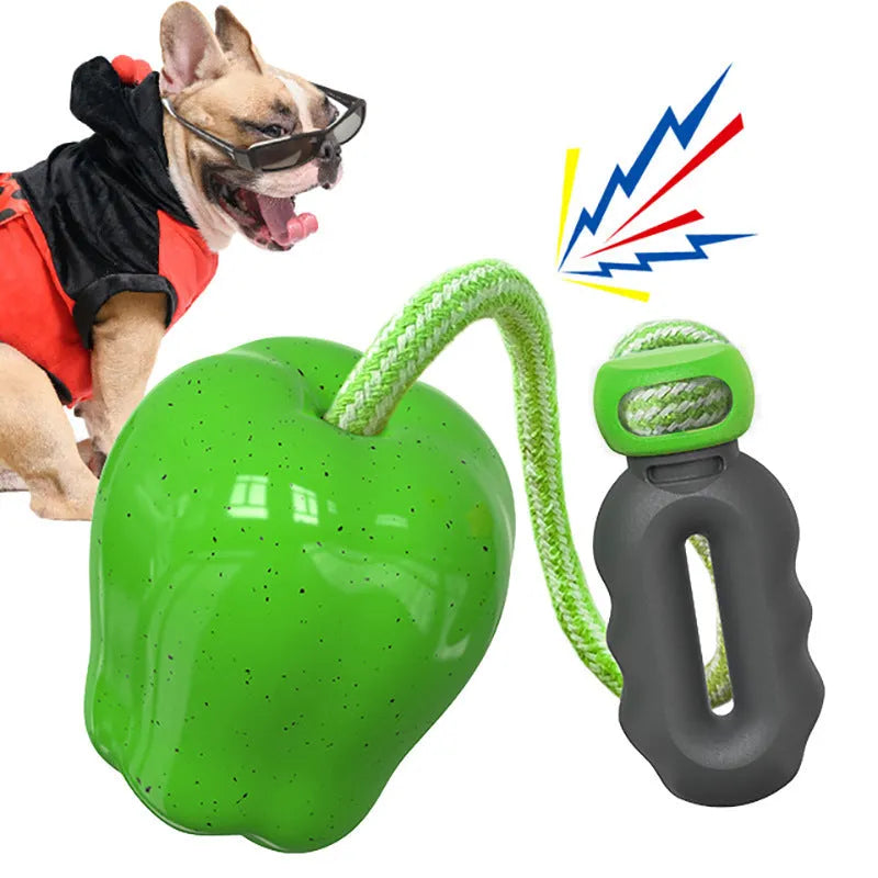 Green plastic dog molar toy with hollow food-dropping design for interactive feeding
