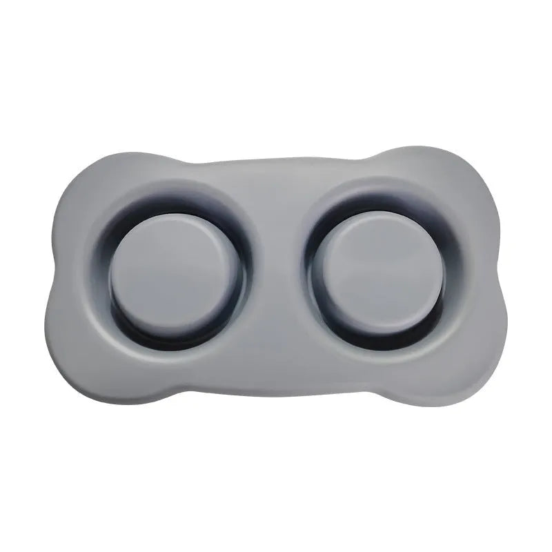 Large silicone dog bowl with stainless steel dish in blue colour on non-slip mat