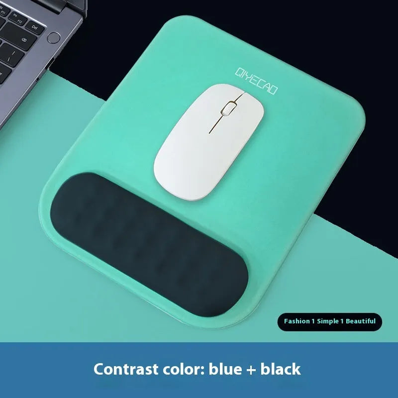 Ergonomic mouse pad with raised wrist support in cloth silicone material showing colour options