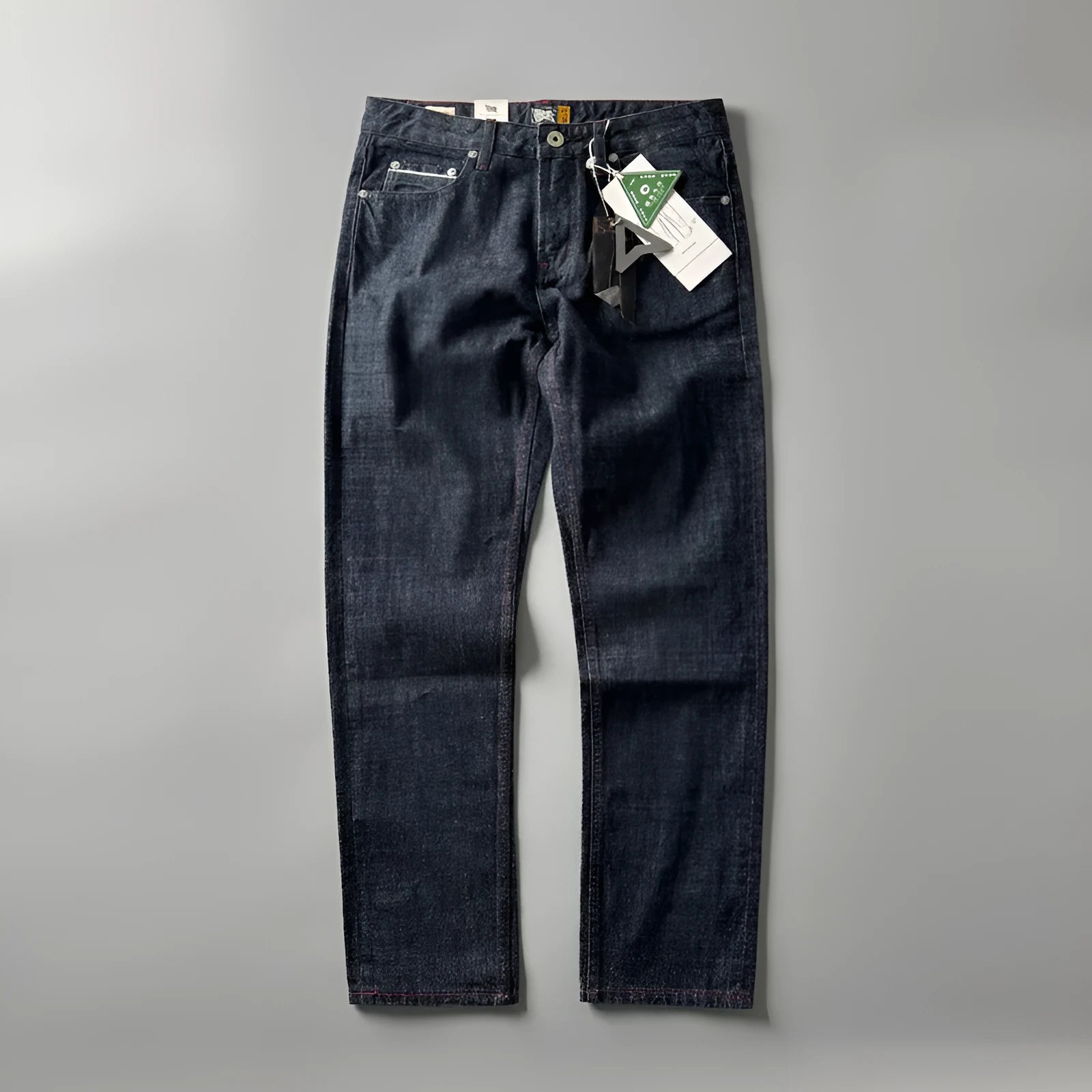 Men's straight leg denim trousers in primary colour with classic five-pocket styling
