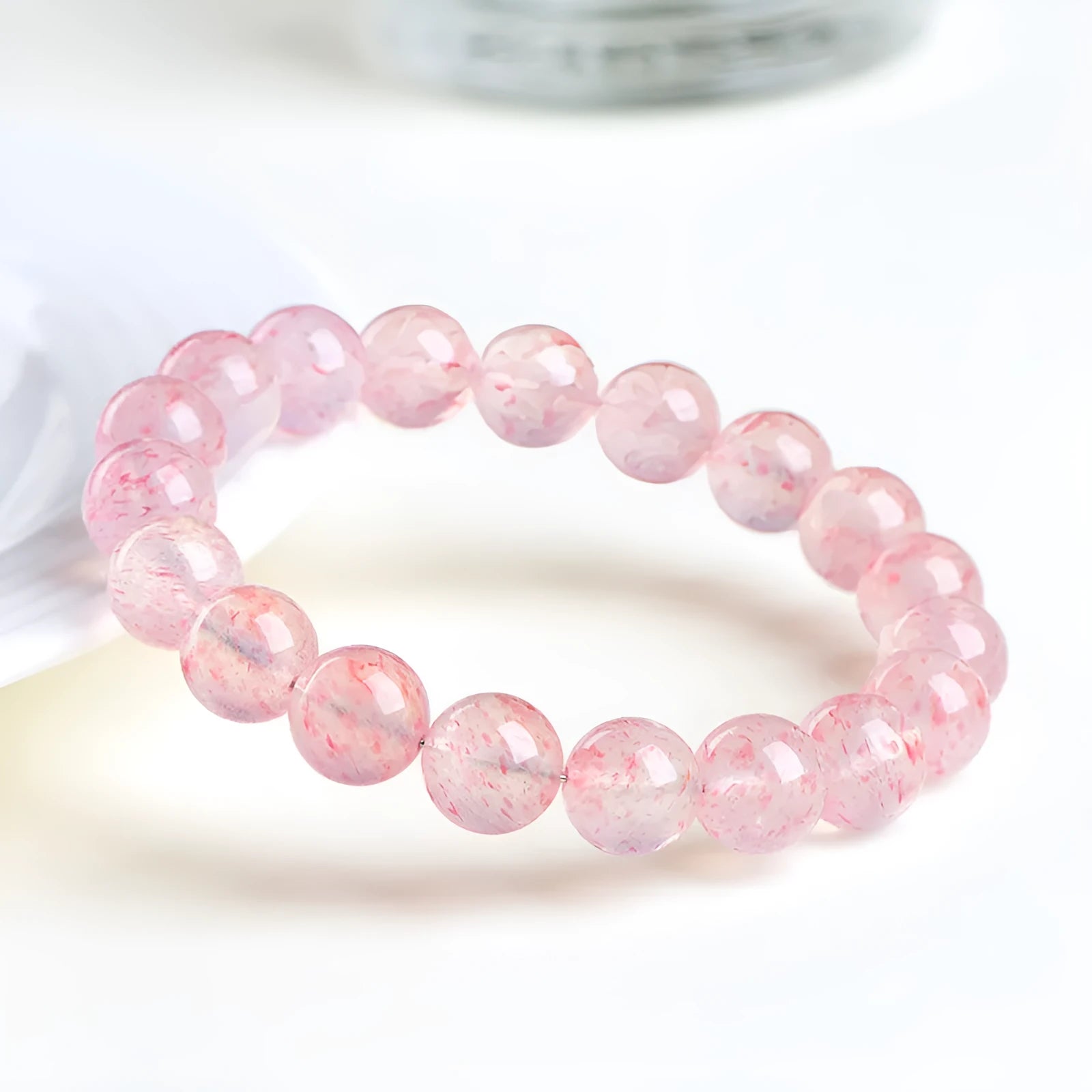 Natural white water strawberry quartz crystal bracelet with 10-10.8mm geometric beads.