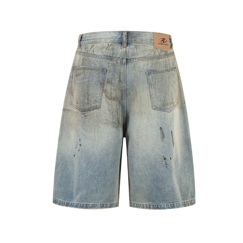 Washed blue straight-leg denim trousers with mid-length cut and zipper fly closure