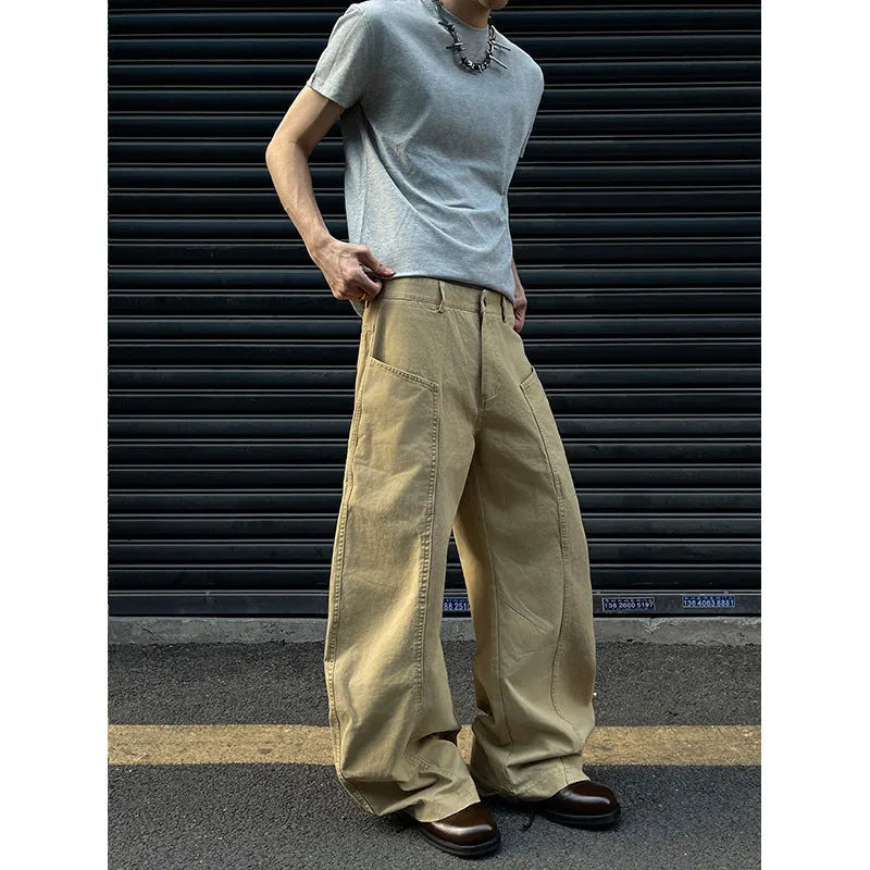Men's straight leg khaki cotton trousers on a hanger, showing classic casual style.