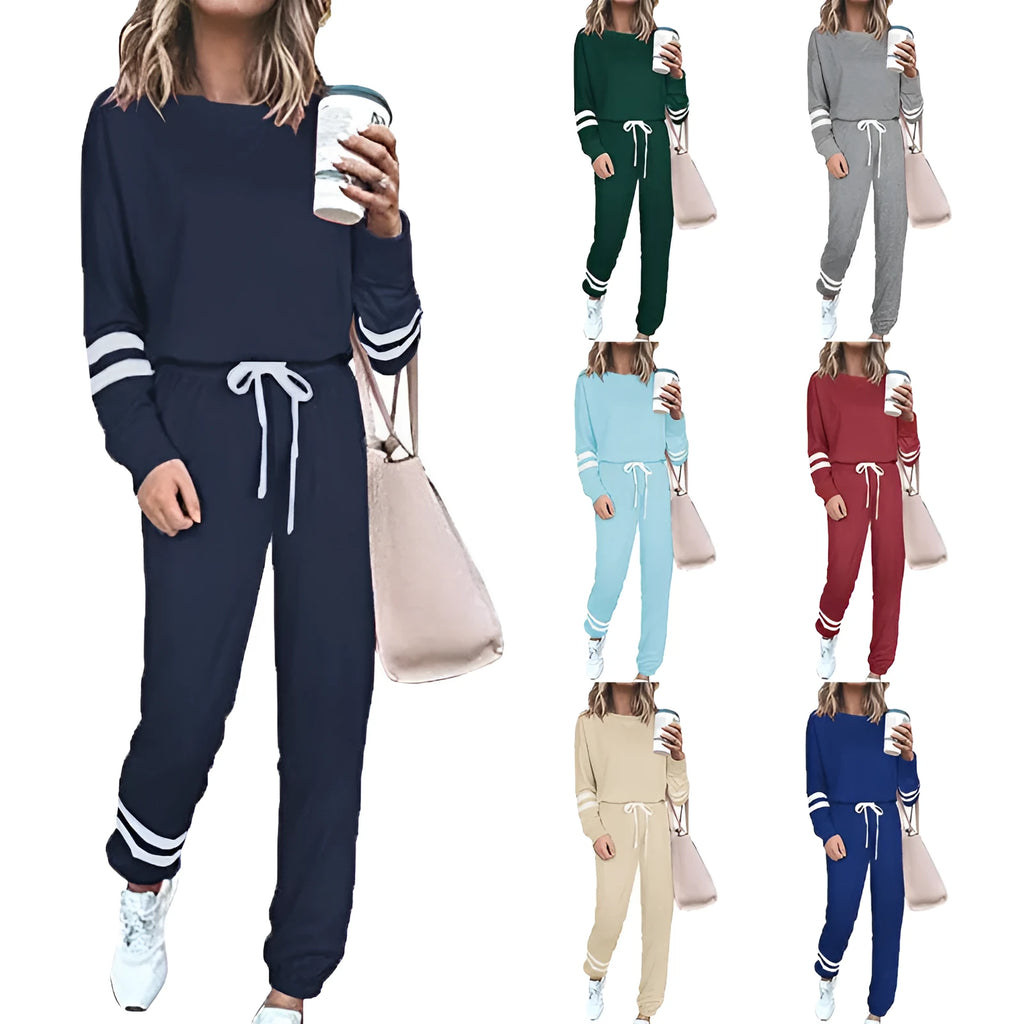 Plus size women's loose-fitting casual suit set in a solid colour, comprising a long-sleeved top and pants.