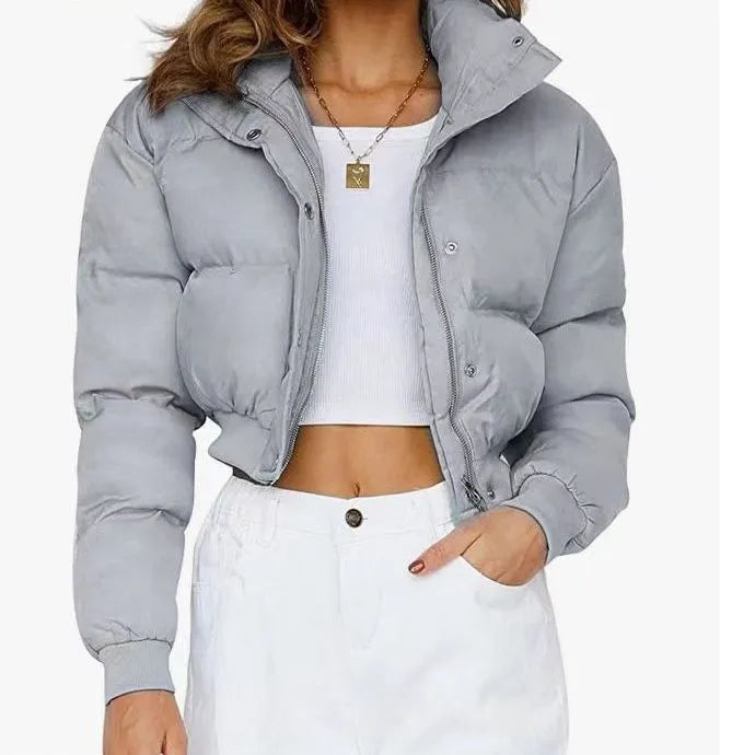 Women's loose blue polyester jacket with long sleeves and regular fit