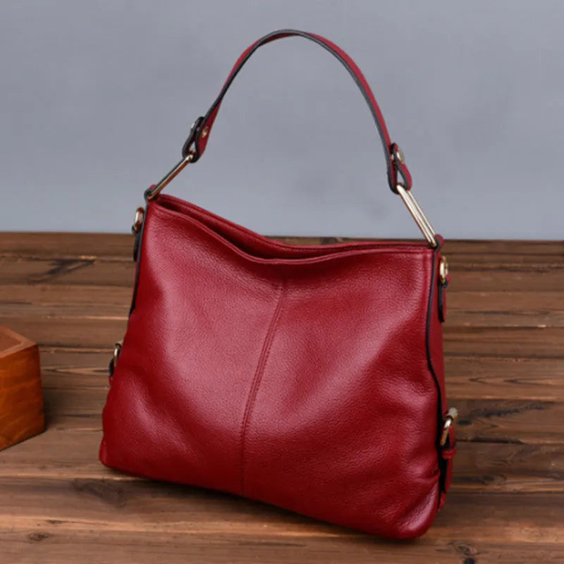 Genuine leather crossbody bag in vertical square silhouette with internal organisation compartments