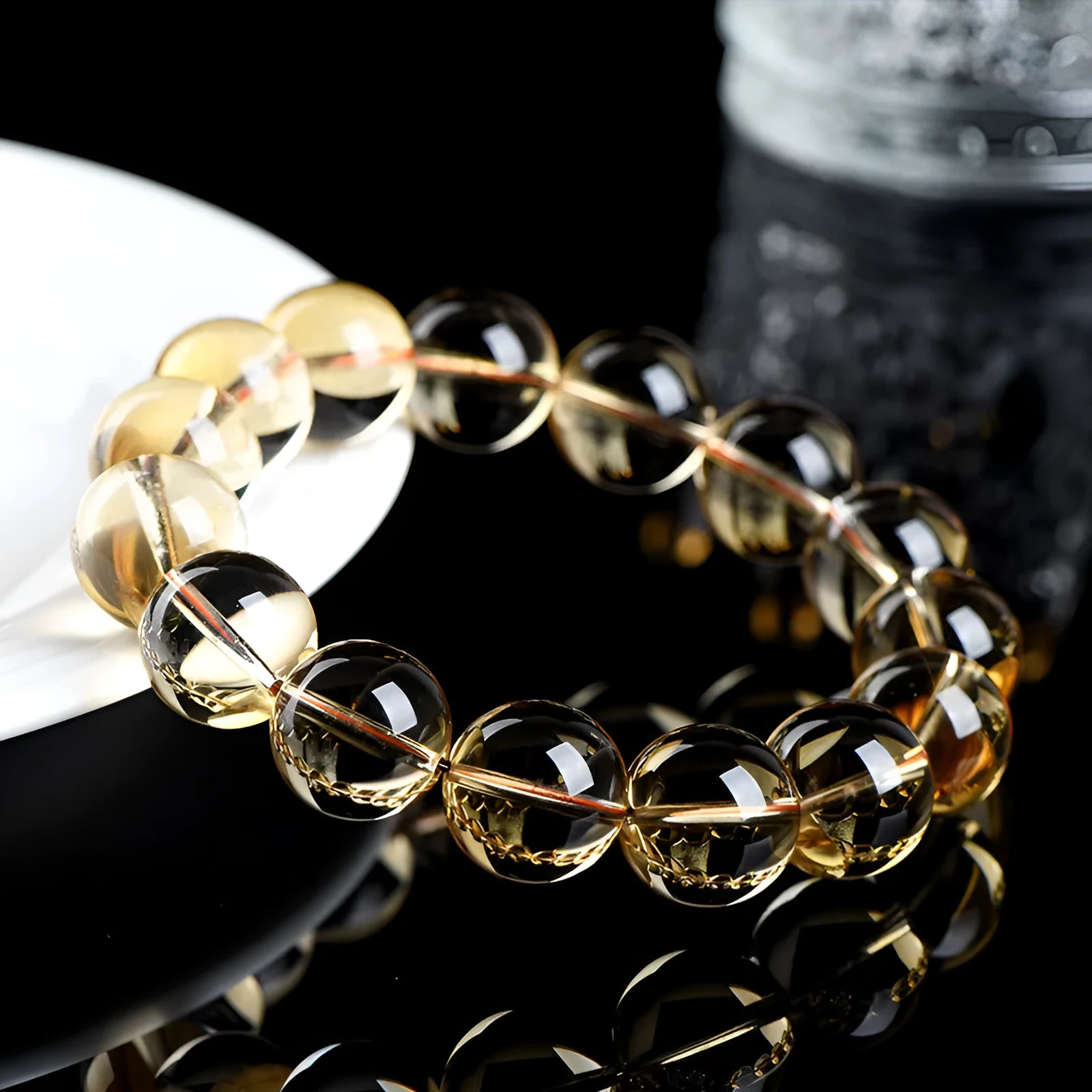 Natural citrine scattered beads ball bracelet showing polished stones in a 7A or 6A grade colour on a wrist.