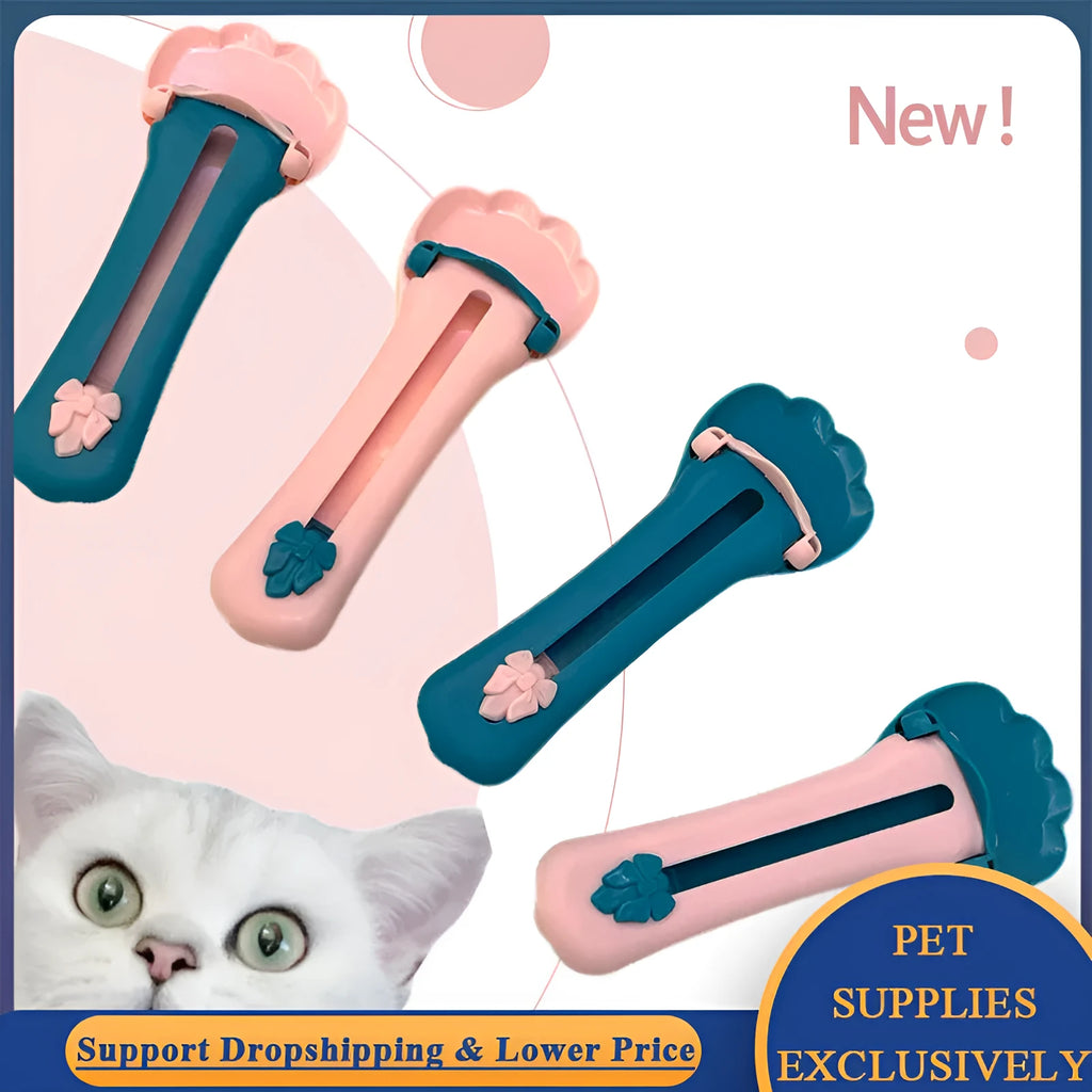 Green and pink two-tone plastic pet food extrusion spoon, 15cm long.
