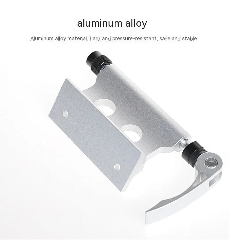 Silver metal quick release bicycle clamp for front fork accessory mounting.