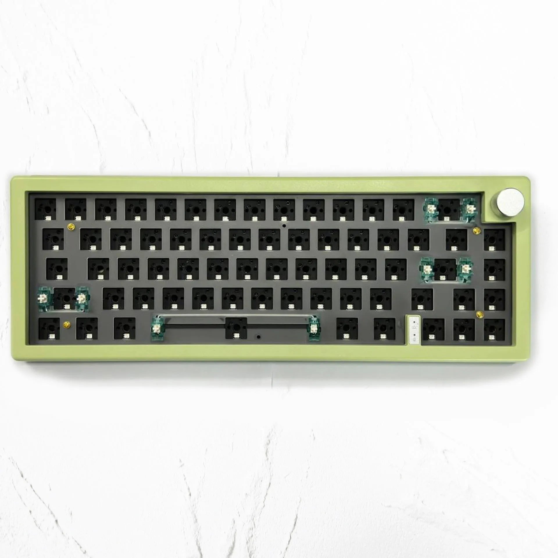 DIY mechanical keyboard kit with RGB lighting and rotary knob in seven colour options
